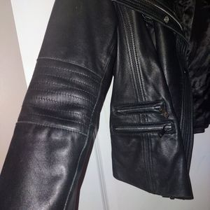Genuine leather jacket with real shearling fur trim